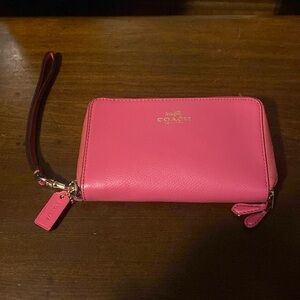 Pink Coach wallet clutch with floral interior